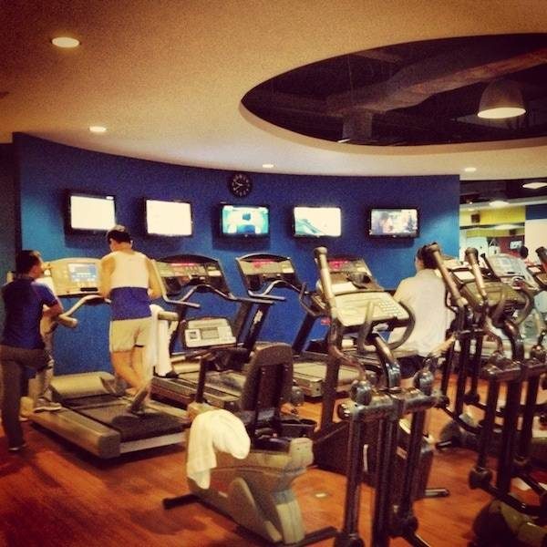 People working out in a gym.