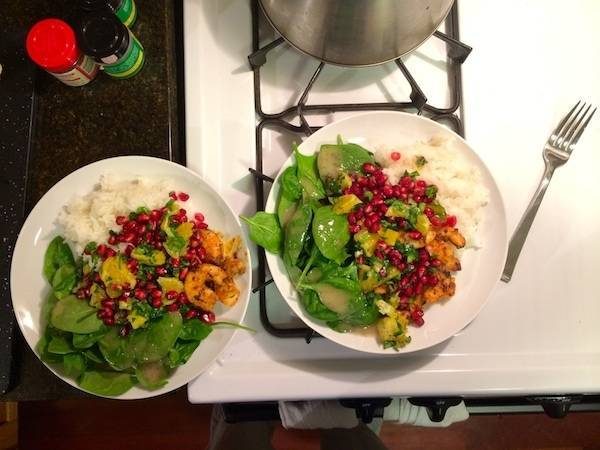 Salad on two white plates.