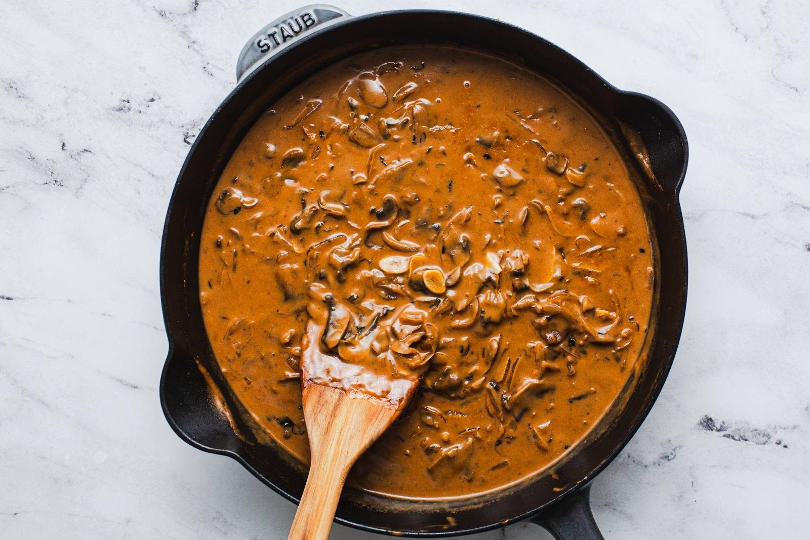 Beef stroganoff gravy in a skillet.