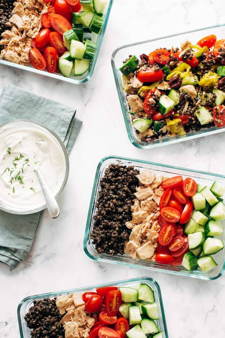 Lentil greek salad in containers.