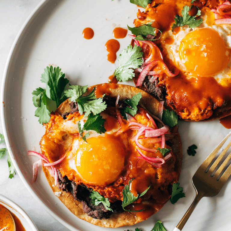 Red chile tostadas with eggs.