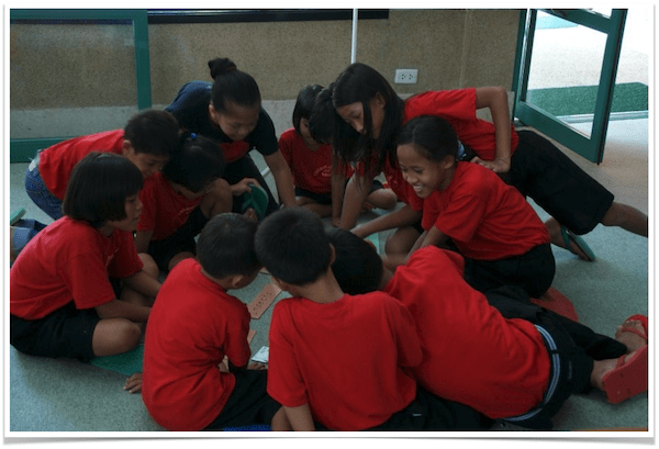 Children in red shirts.