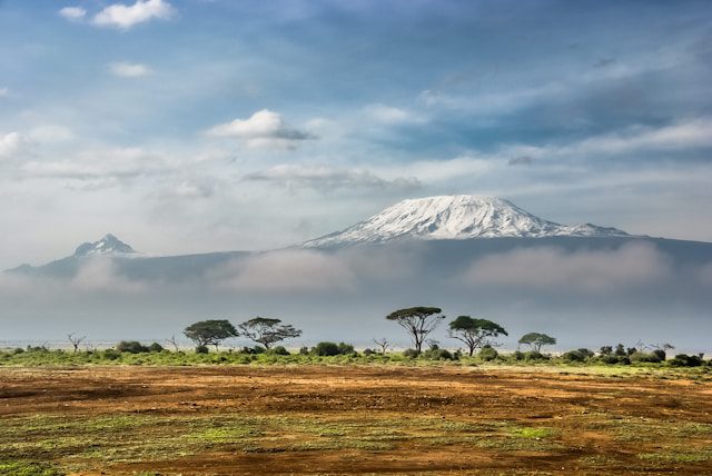A view of the Kenyan landscape in the backdrop of a mountain