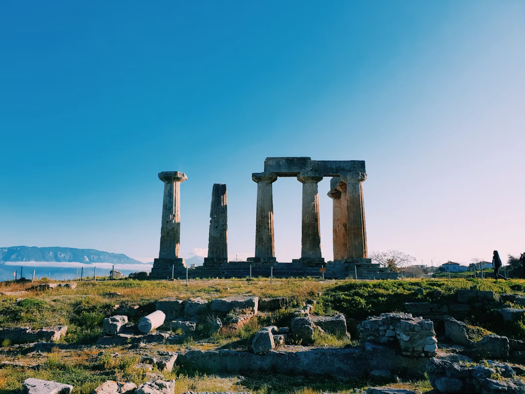 Ancient Temple of Apollo at Delphi with mountain views