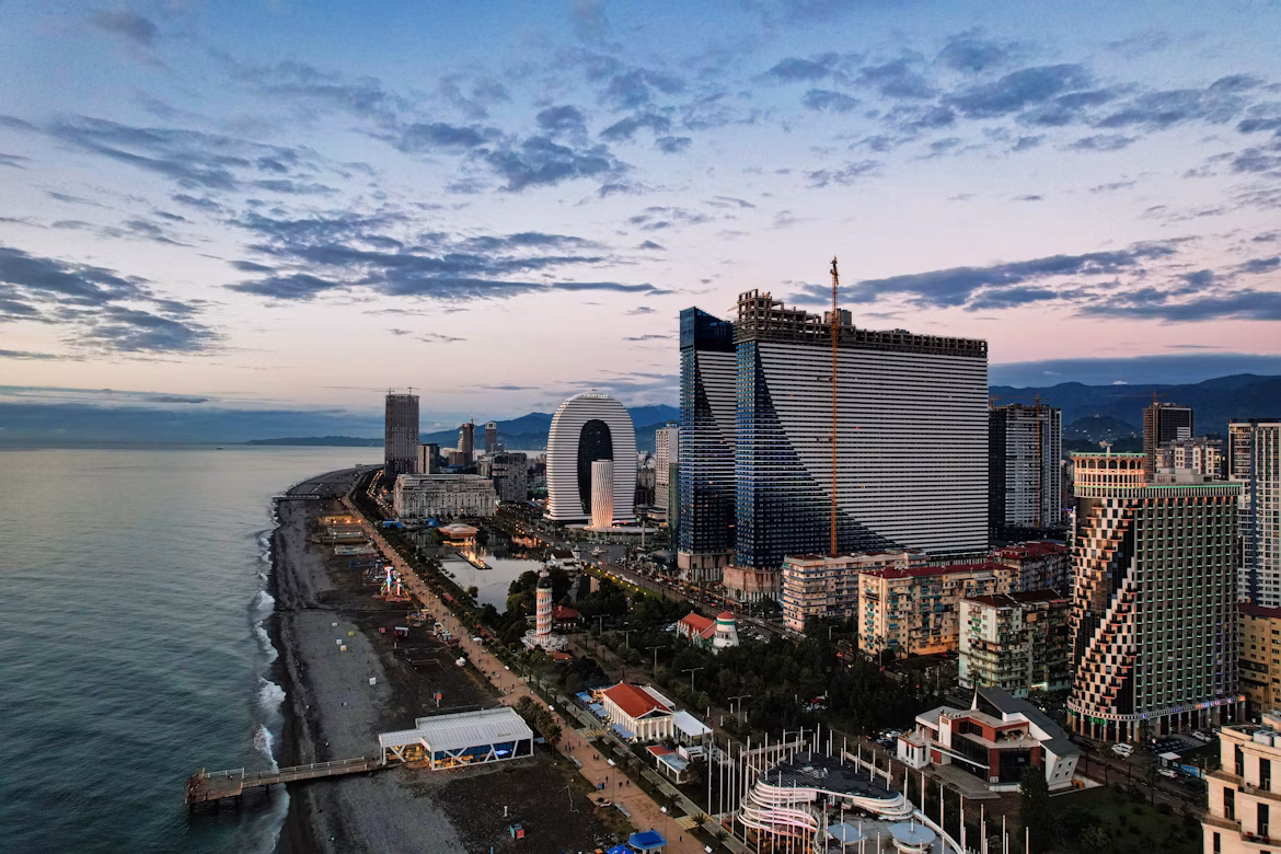 Batumi beachfront and skyline at sunset