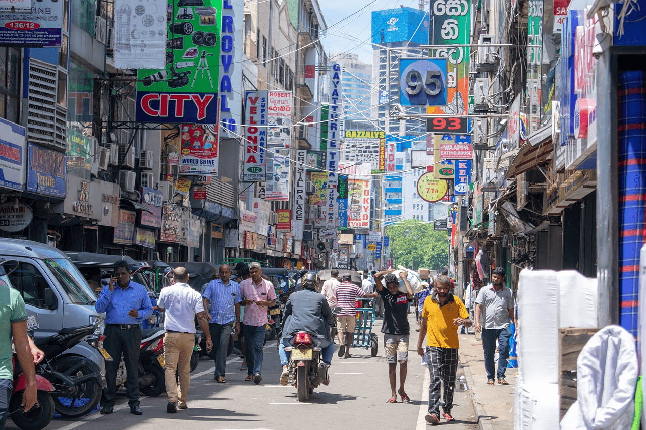 Busy street market in Sri Lanka filled with people