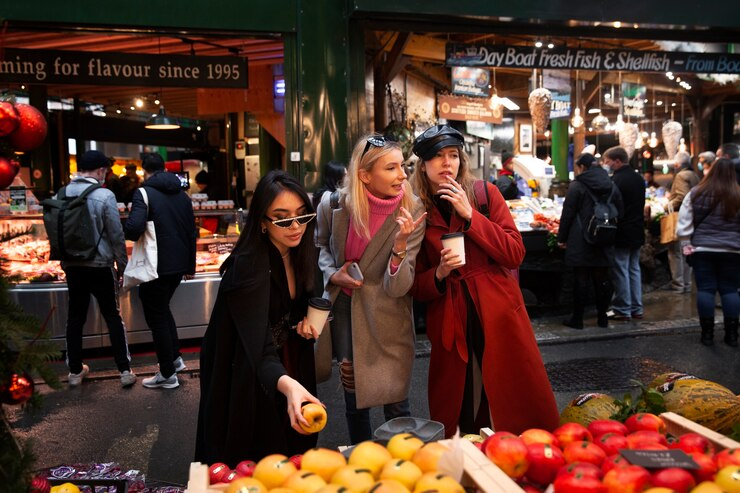 Busy street market with shoppers in Australia
