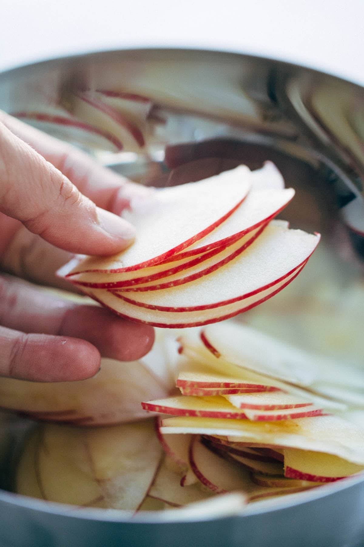 These layered bars are so simple! Loaded with homemade caramel and apples. Caramely apple layer tucked in by a brown sugar-y crust on both sides. | pinchofyum.com These layered bars are so simple! Loaded with homemade caramel and apples. Caramely apple layer tucked in by a brown sugar-y crust on both sides. | pinchofyum.com