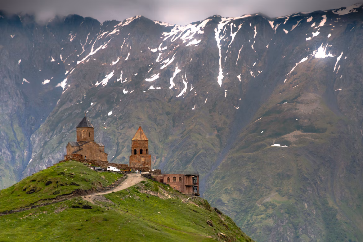 Gergeti Trinity Church under Mount Kazbek in autumn