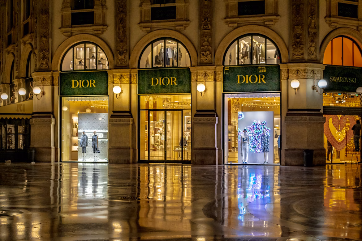 Italian designer storefronts with luxury fashion displays in Milan