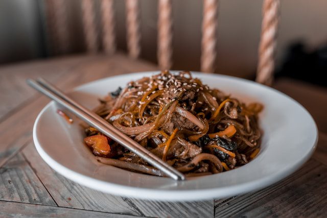 Japchae: Sweet, savory, and full of vibrant flavors.