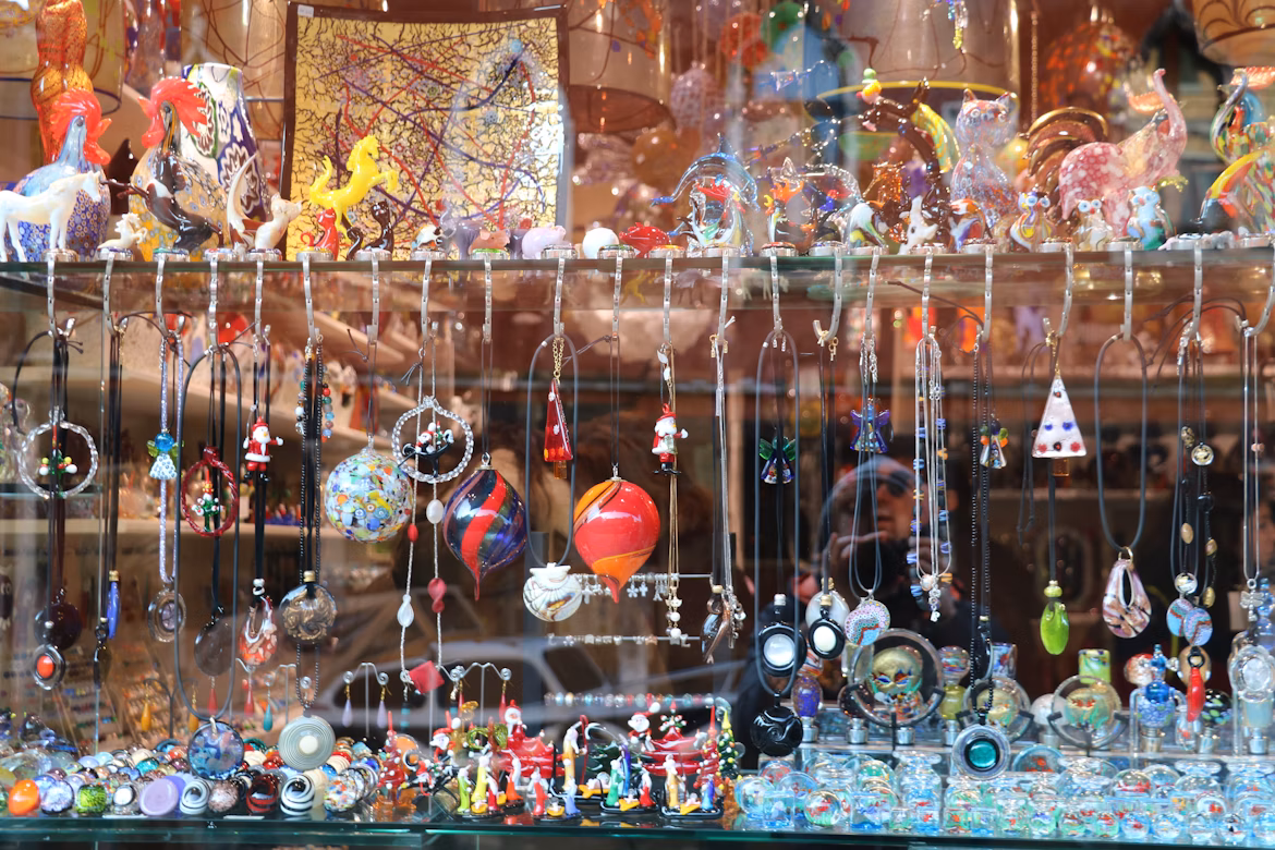 Colorful Murano glass vases and sculptures in a Venice shop
