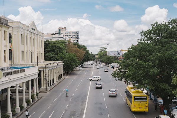 Wide boulevard with colonial buildings