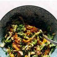 Napa chicken salad in a bowl with a fork