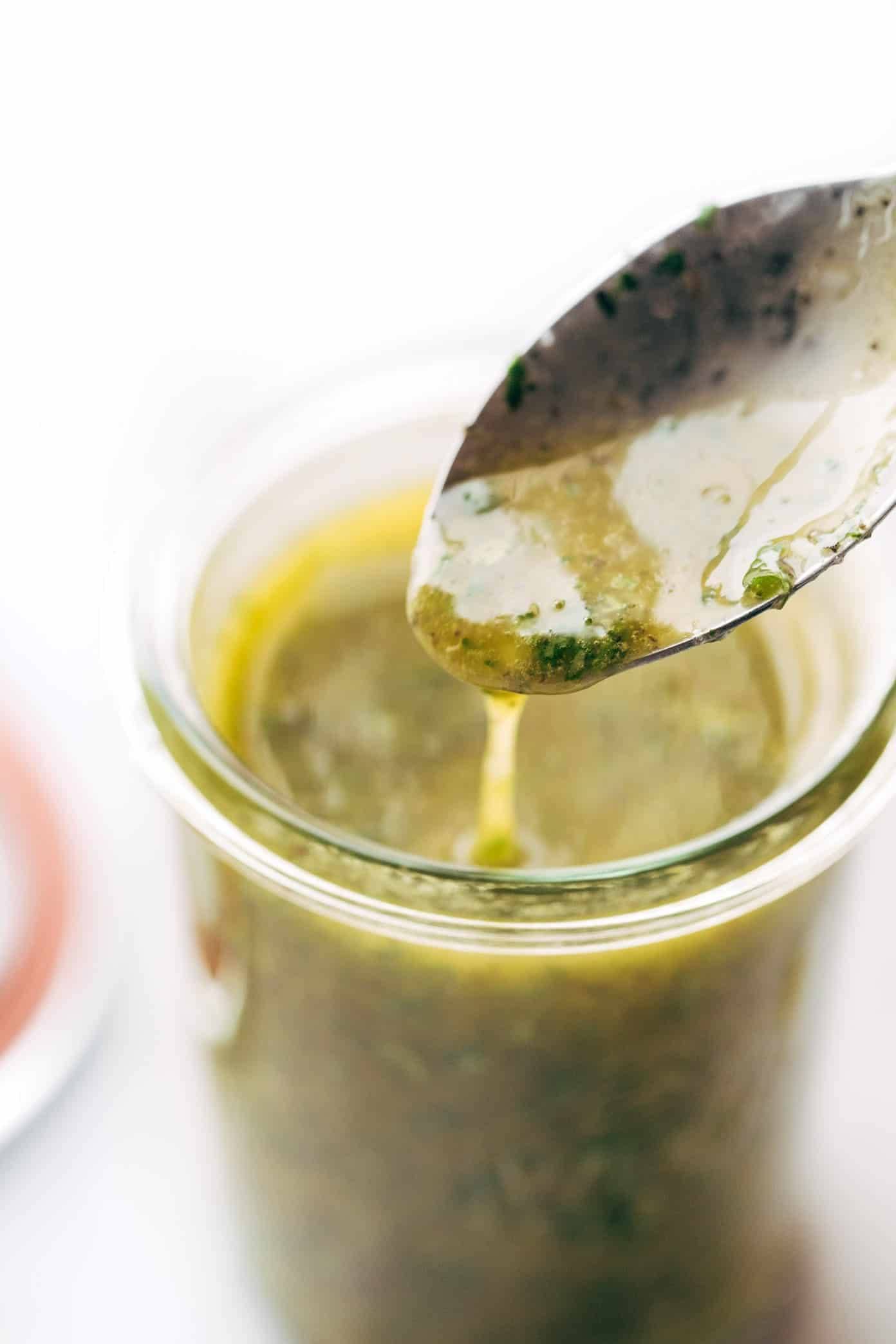 Sunshine Sauce dripping off the spoon.