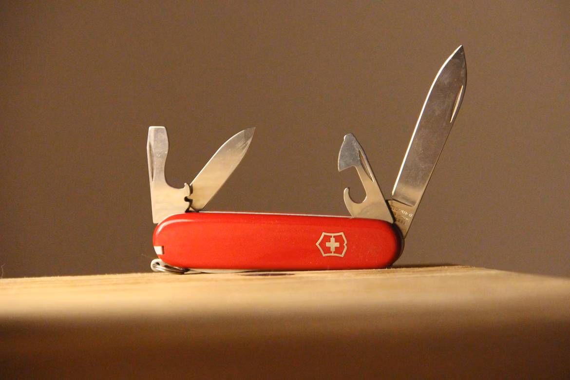 Classic Red Swiss Pocket Knive in Display
