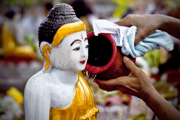 Watering Buddha image in Kason Festival, Myanmar