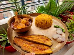 Crispy Begun Bhaja in a non-veg thali