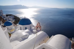 Sunlit white houses in Santorini, Greece
