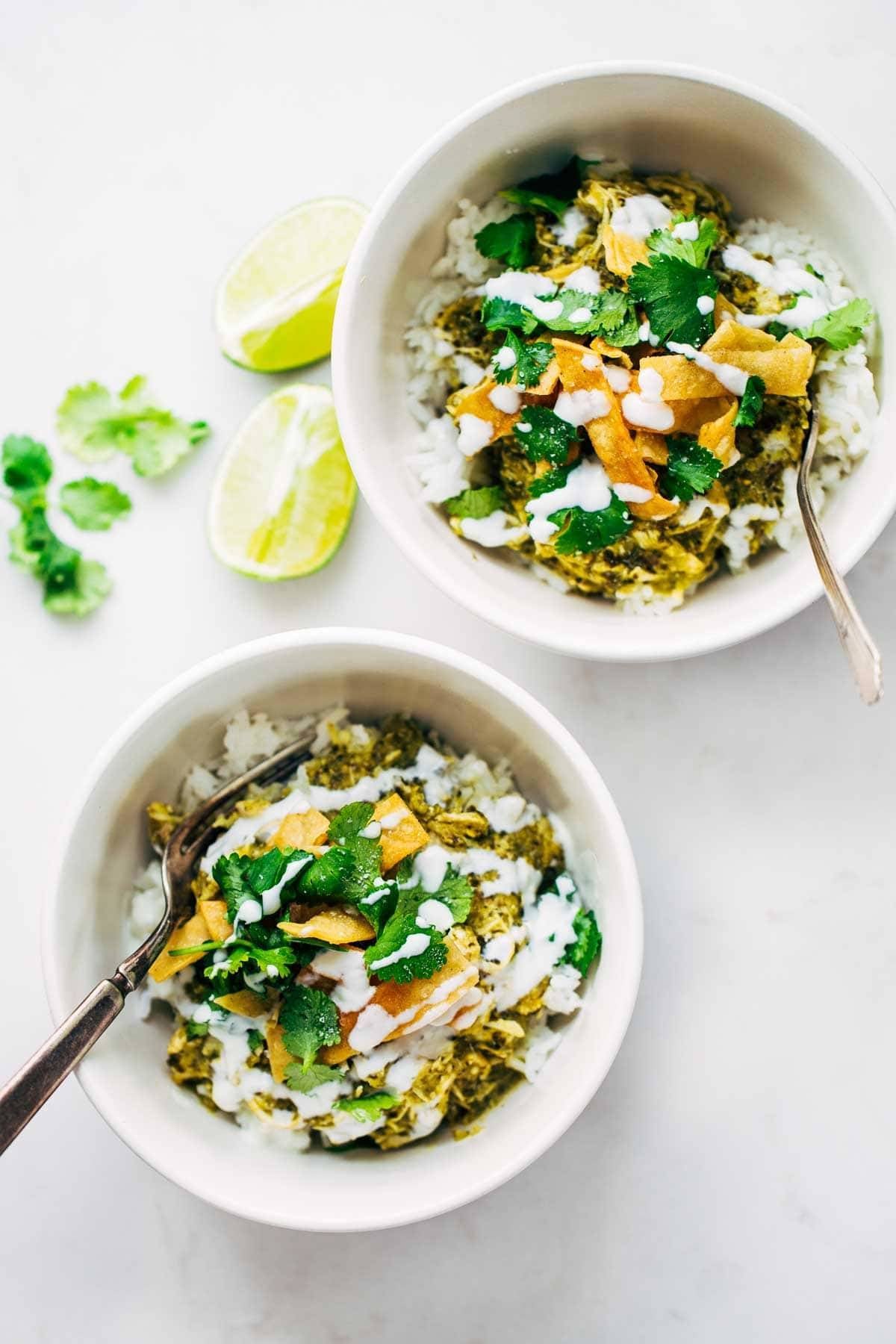 Roasted Tomatillo Chicken and Rice Bowls with limes.